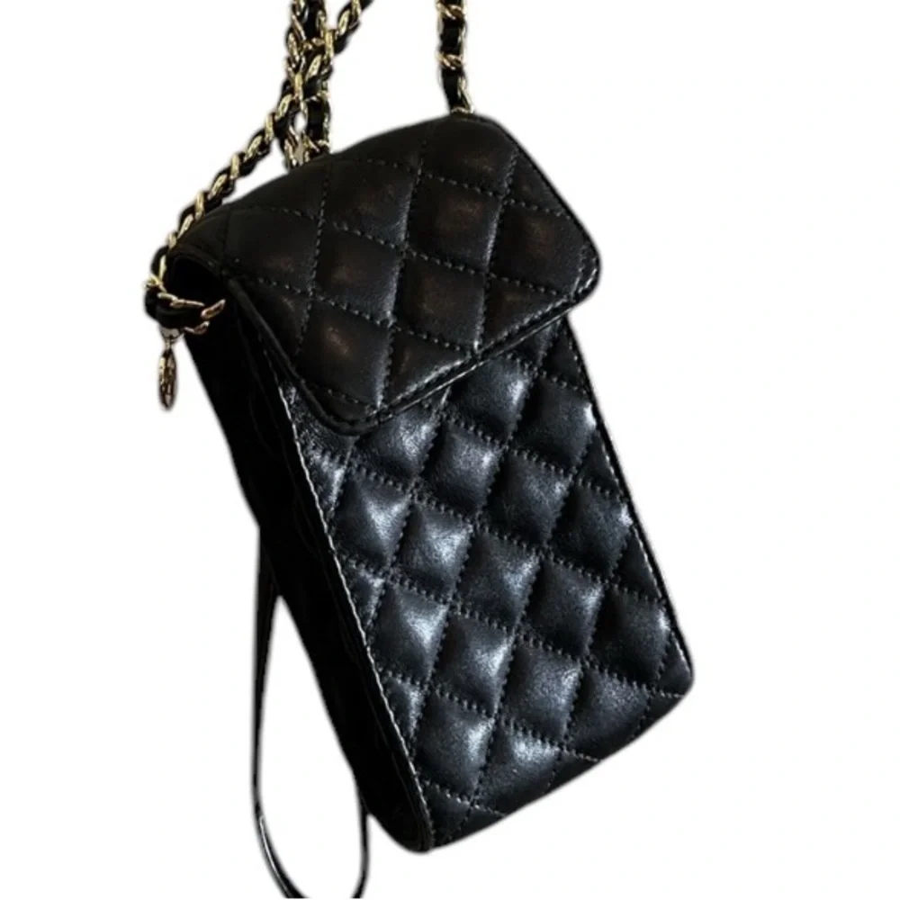Micheal Kors Sloane black quilted leather crossbody gold hardware snap closure